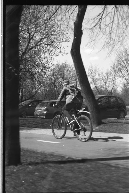 Man Riding on Bike Lane