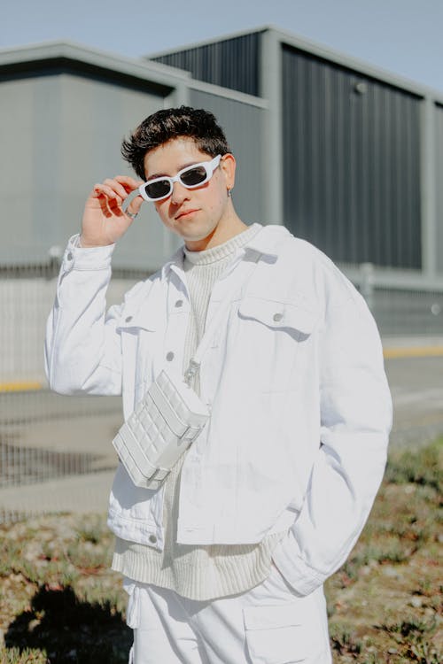 Man in Sunglasses and White Jacket