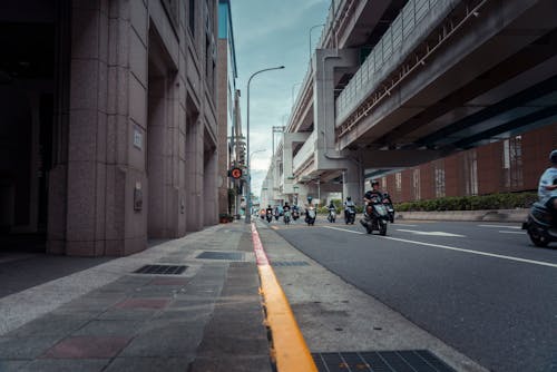 Gratis stockfoto met plaats, scooters, stadsgezicht