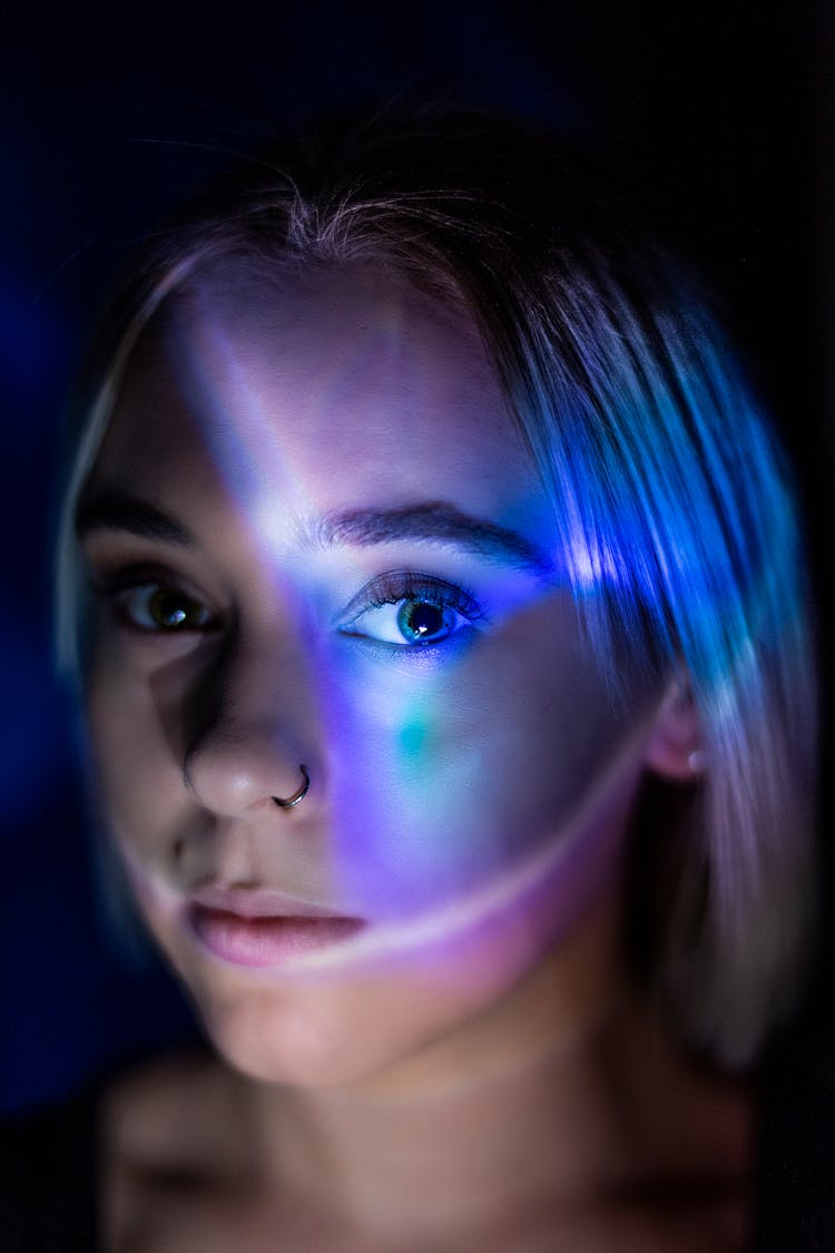 Portrait Of Blonde Woman In Blue Light 