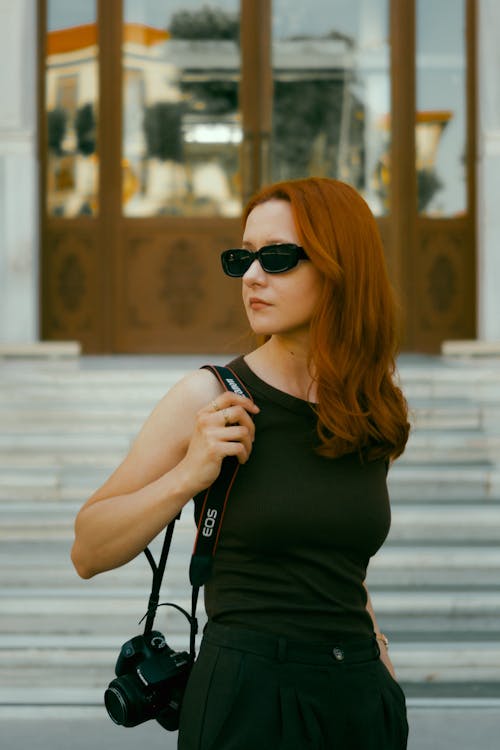 Redhead Woman in Sunglasses