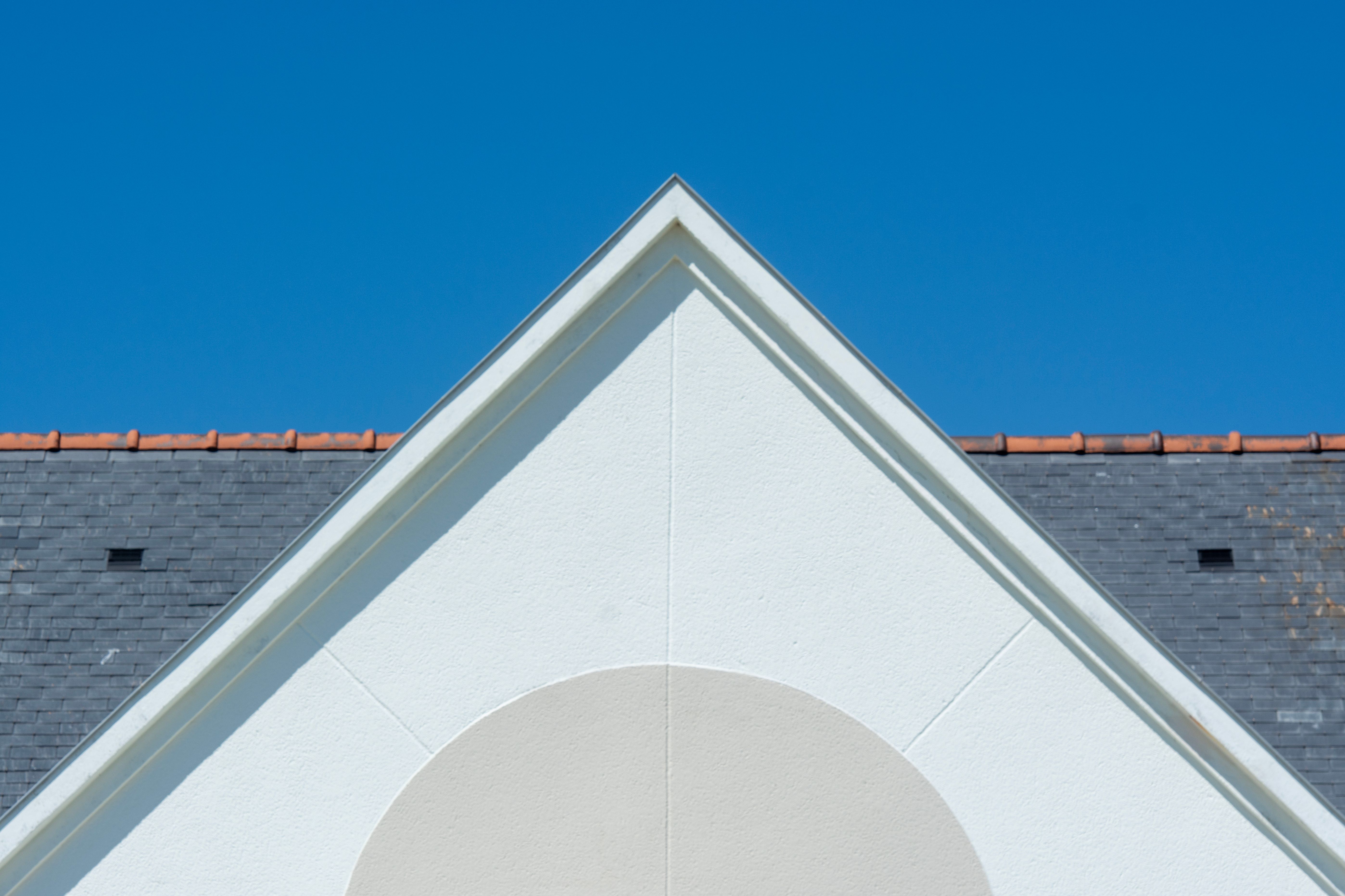 Comparing natural slate shingles versus clay tiles