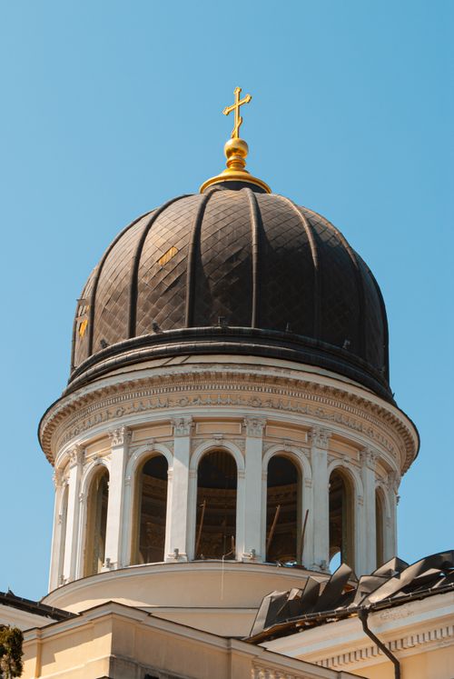 Free A close-up view of the stunning dome of an Orthodox cathedral in Odesa, Ukraine, against a clear blue sky. Stock Photo