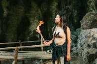 Woman Holding Torch