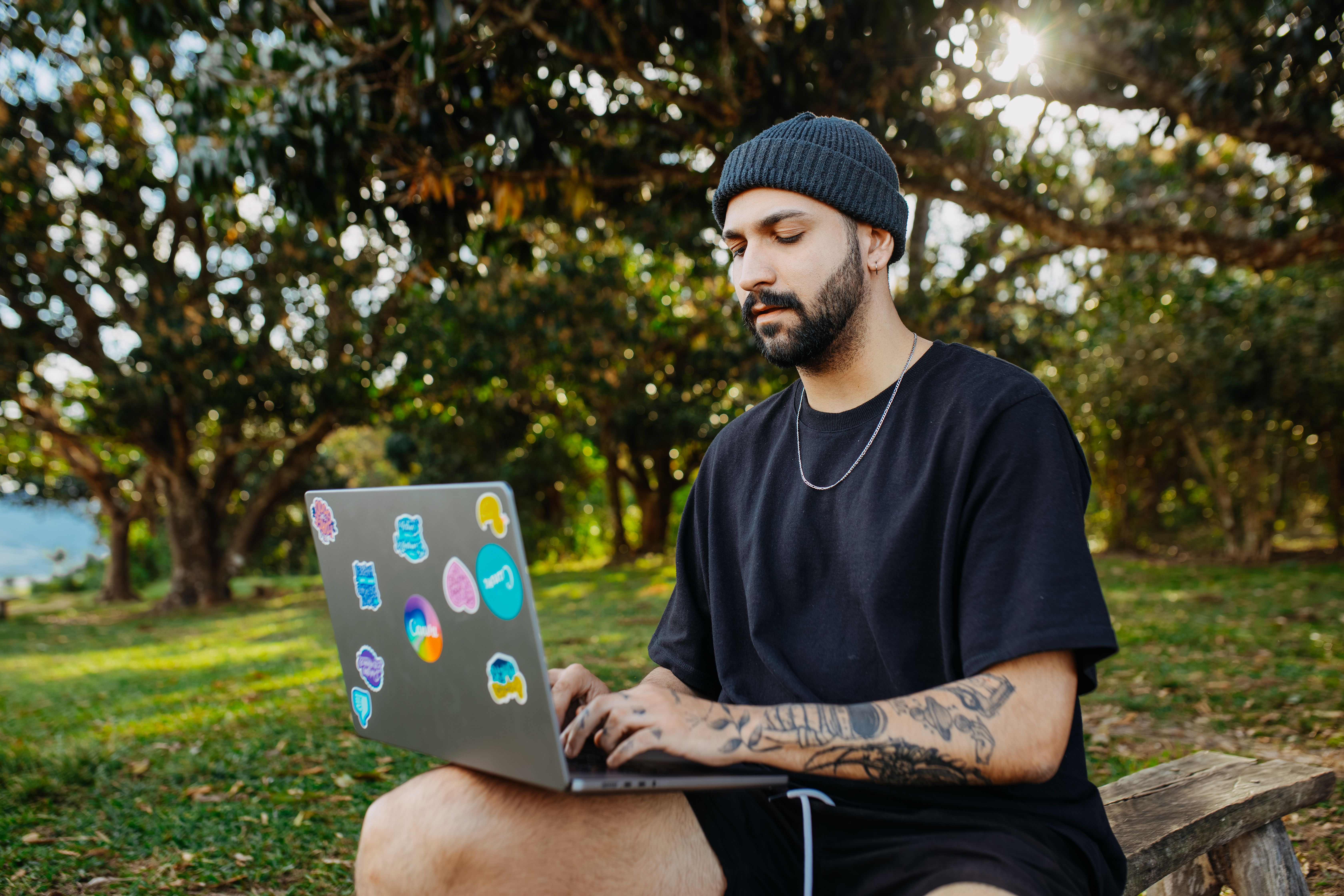 person feeling calm and focused in front of a laptop