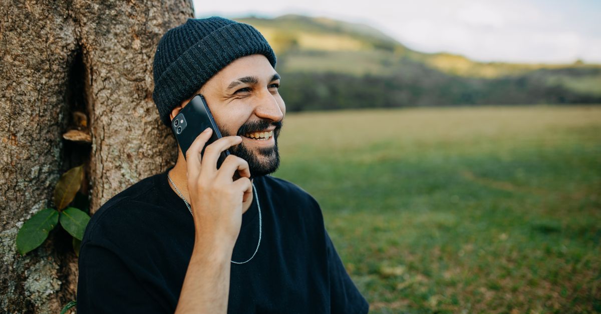 man laughing phone