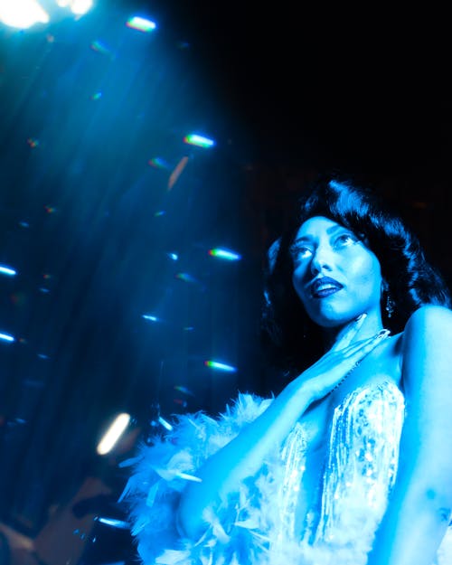 Artistic Studio Shot of a Woman in a Dress in Blue Lighting 