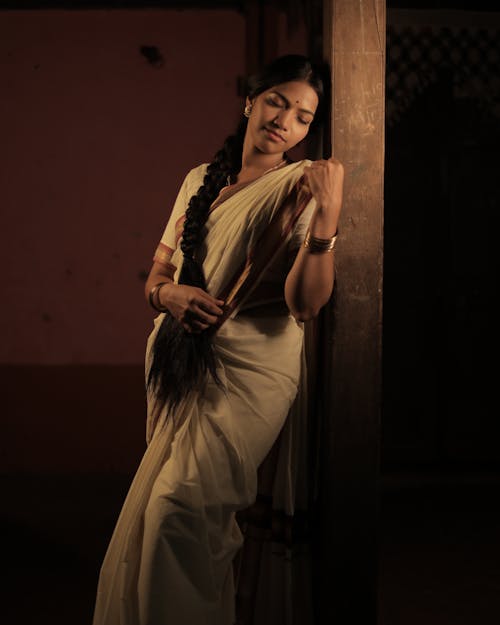 Model Posing in White Sari