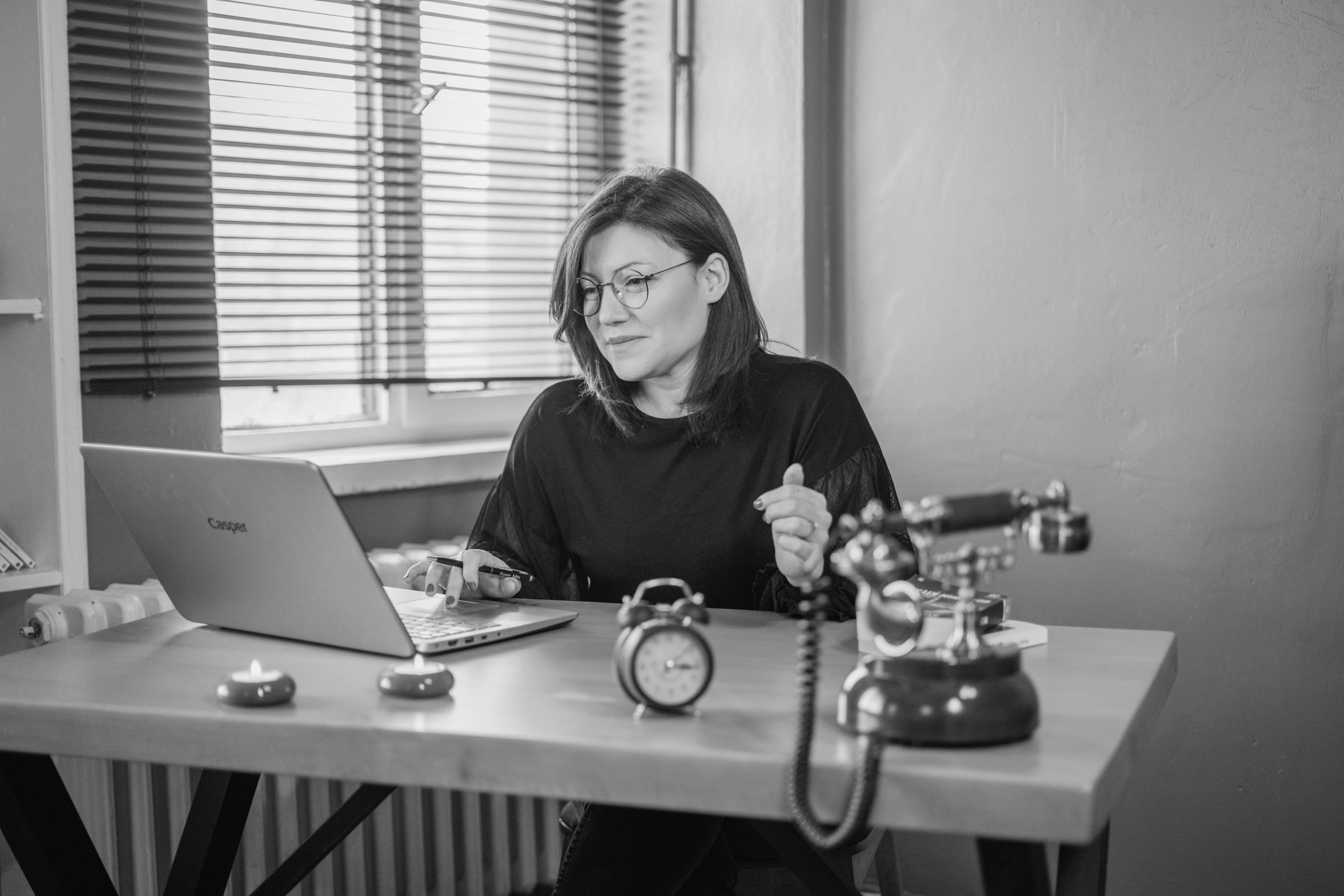 Woman Working in Office in Black and White · Free Stock Photo