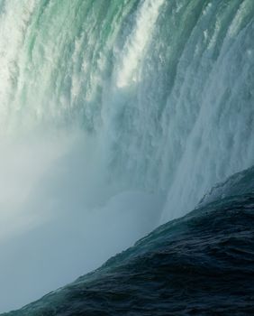 Close-up view of the powerful and iconic Niagara Falls waterfall.