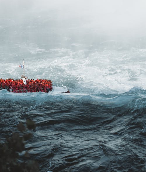 People on a Boat on a Rough Sea 