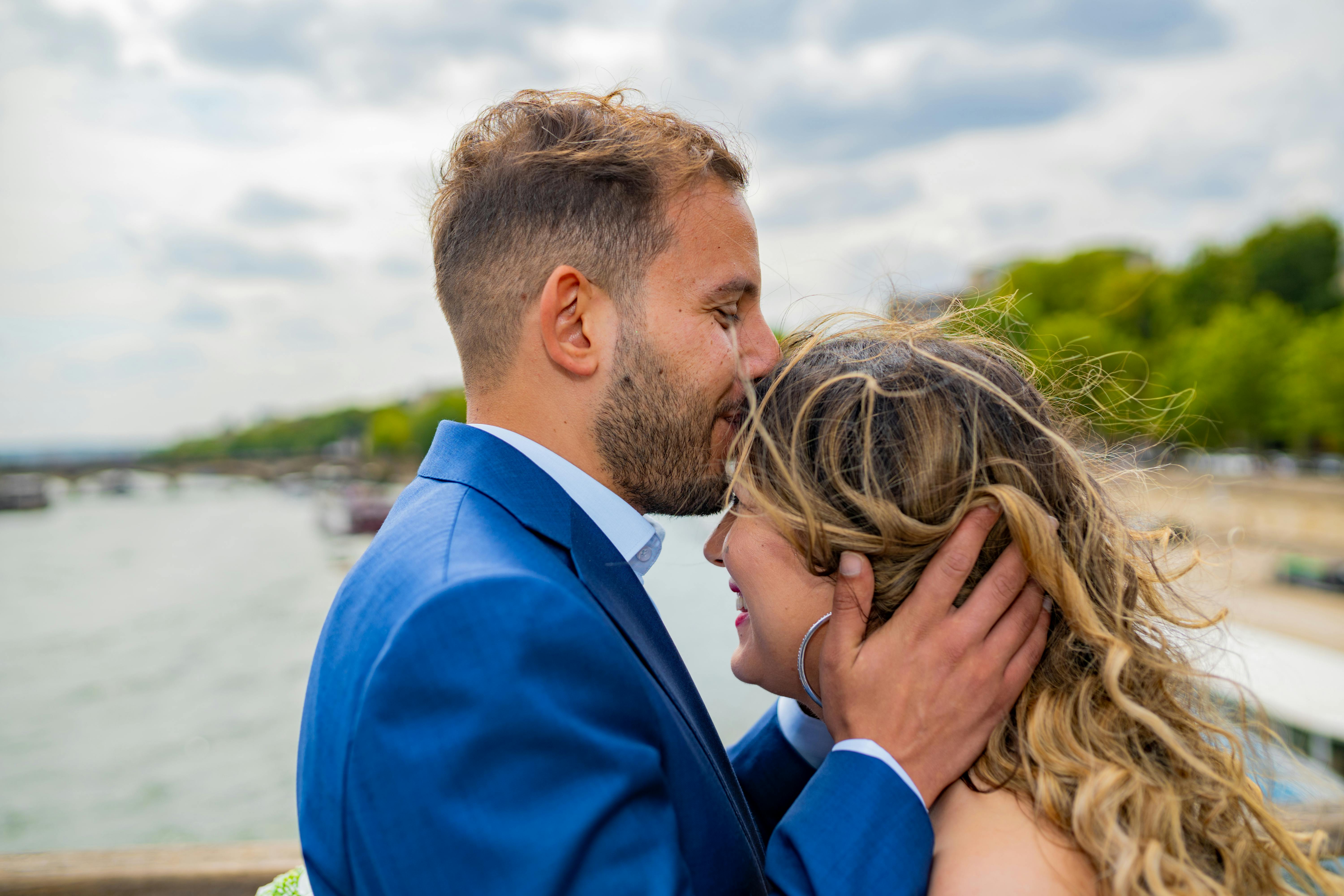 Couple Kissing on a Beach · Free Stock Photo