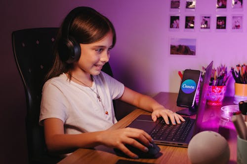 Smiling Girl Sitting with Laptop