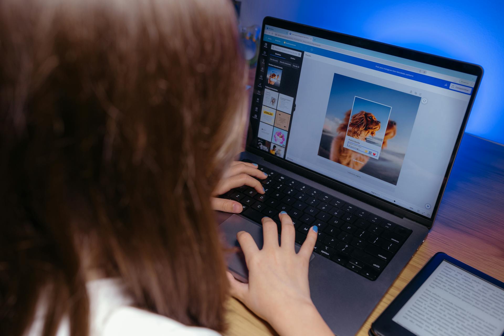 Child using a laptop for a creative design project, focused on learning and technology.