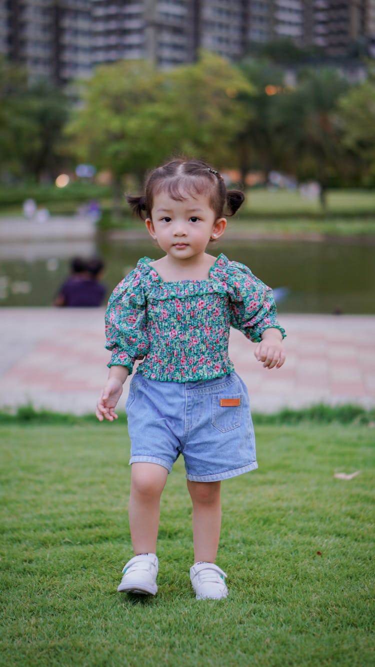 Little Girl On A Lawn