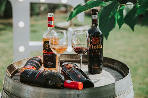 Bottles and Glasses of Wines on Keg