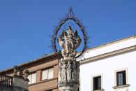 Sculpture of religious significance in a public square in Jerez de la Frontera.