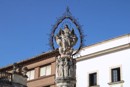 Sculpture of religious significance in a public square in Jerez de la Frontera.