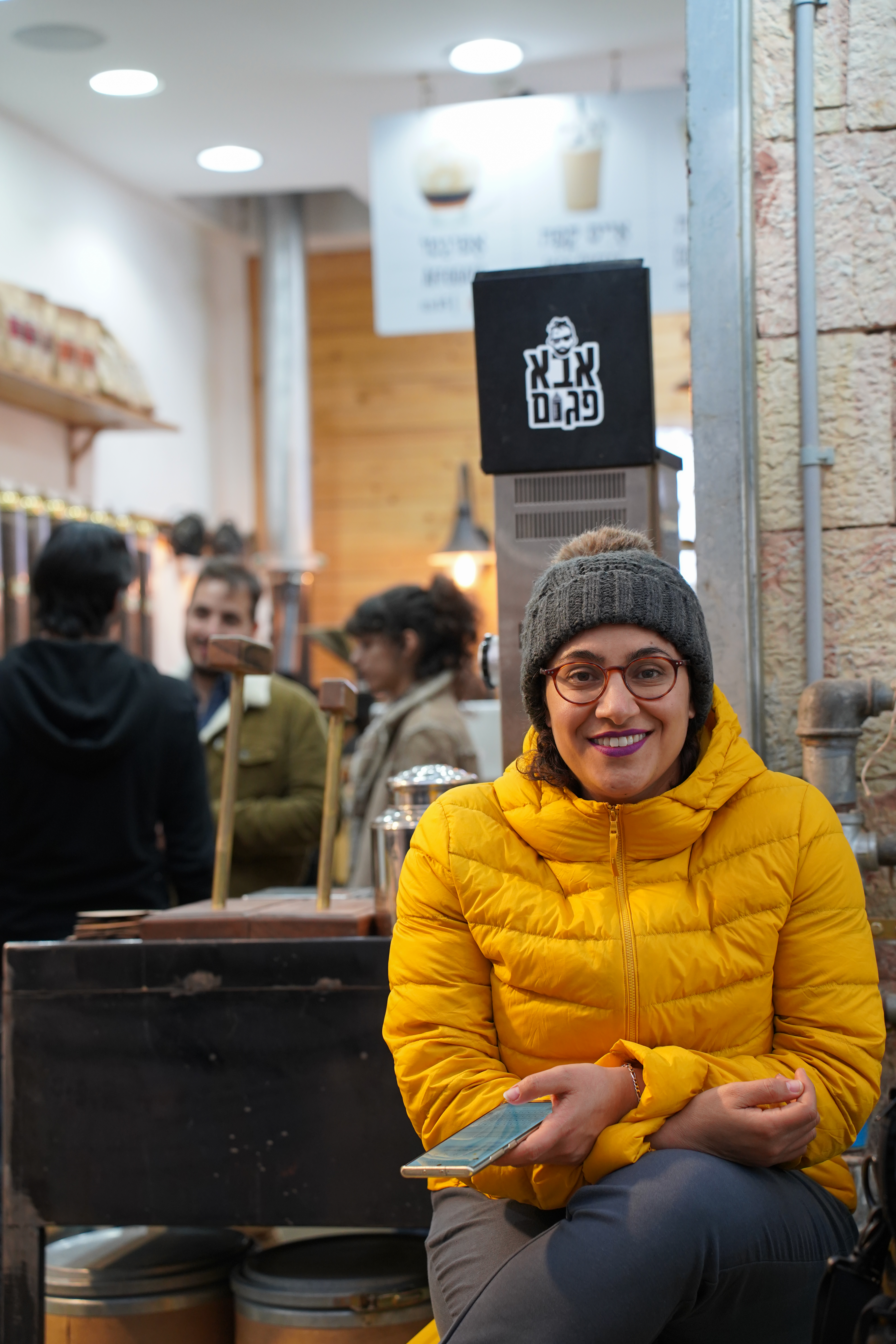 Smiling Woman in a Yellow Jacket · Free Stock Photo