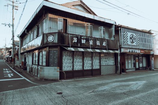 Explore traditional Japanese architecture along a quiet street in Ayabe, Kyoto.