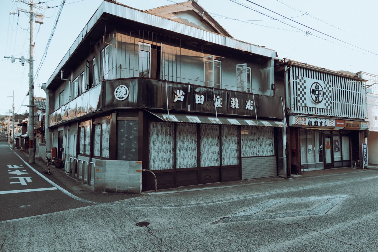 explore traditional japanese architecture along a quiet street in ayab