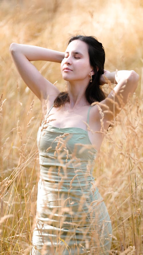 Portrait of a Woman Standing in a Field