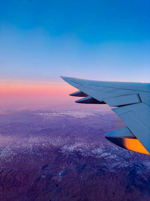 Wing of Flying Airplane