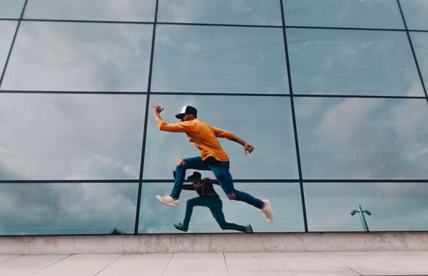 a man jump running in casual clothing