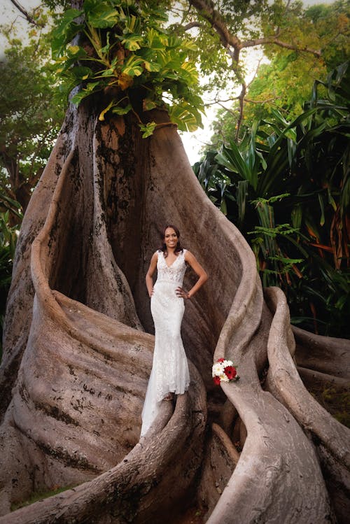 Woman In White Sleeveless Wedding Dress