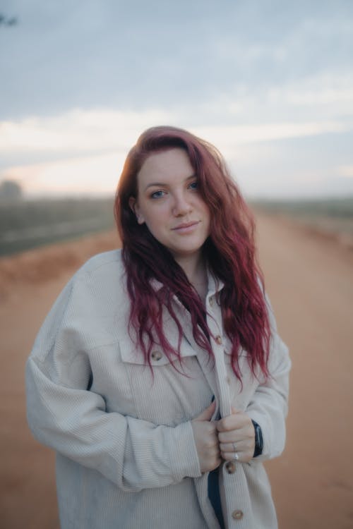 Portrait of a Young Woman with Dyed Hair Wearing a Cardigan