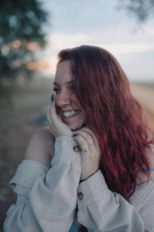 Portrait of a Young Woman with Dyed Hair Smiling