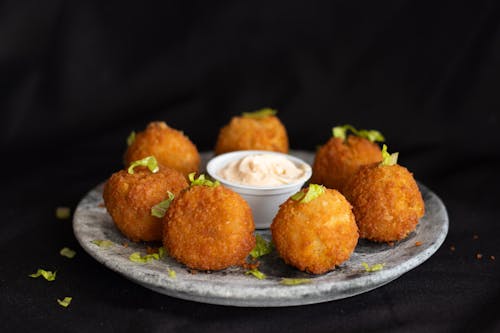 Free Crispy Chicken Balls Served on Plate  Stock Photo