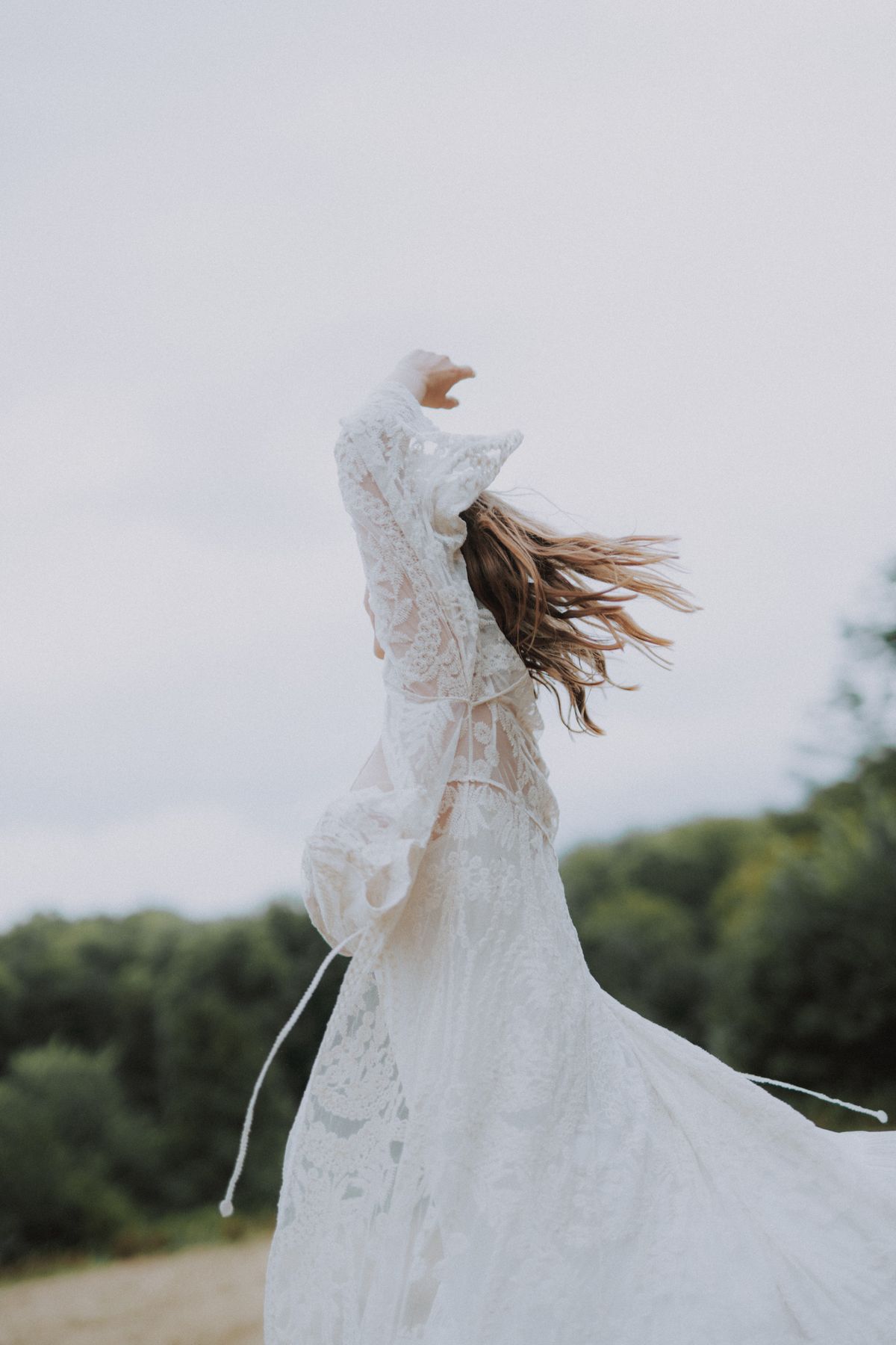 A woman in a white dress — a quiet boho moment