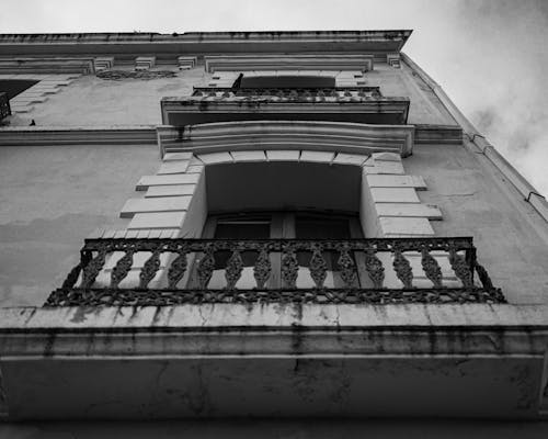 Free Low Angle Shot of the Facade of a Traditional Building  Stock Photo