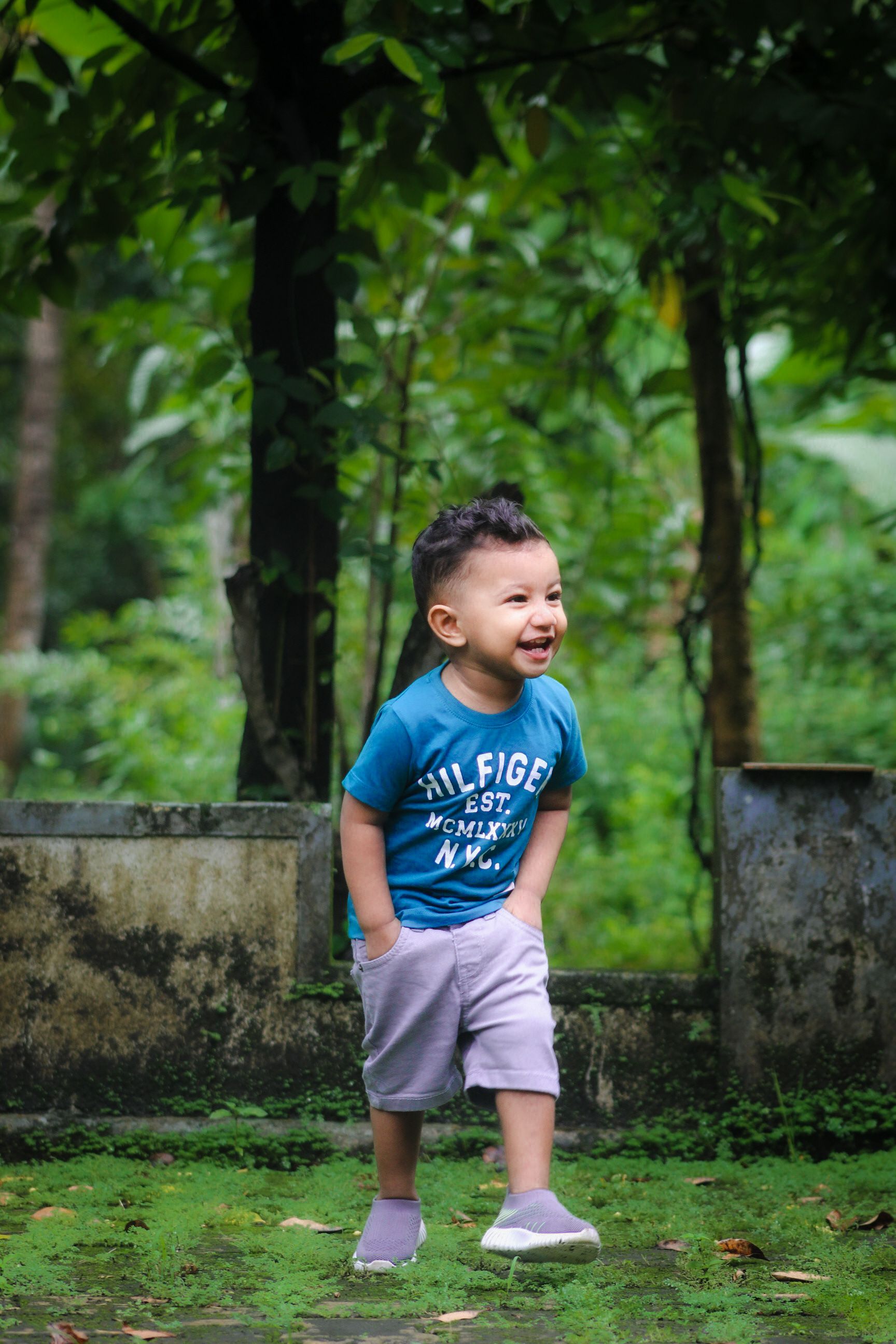 Little Boy Walking with his Hands in Pockets · Free Stock Photo