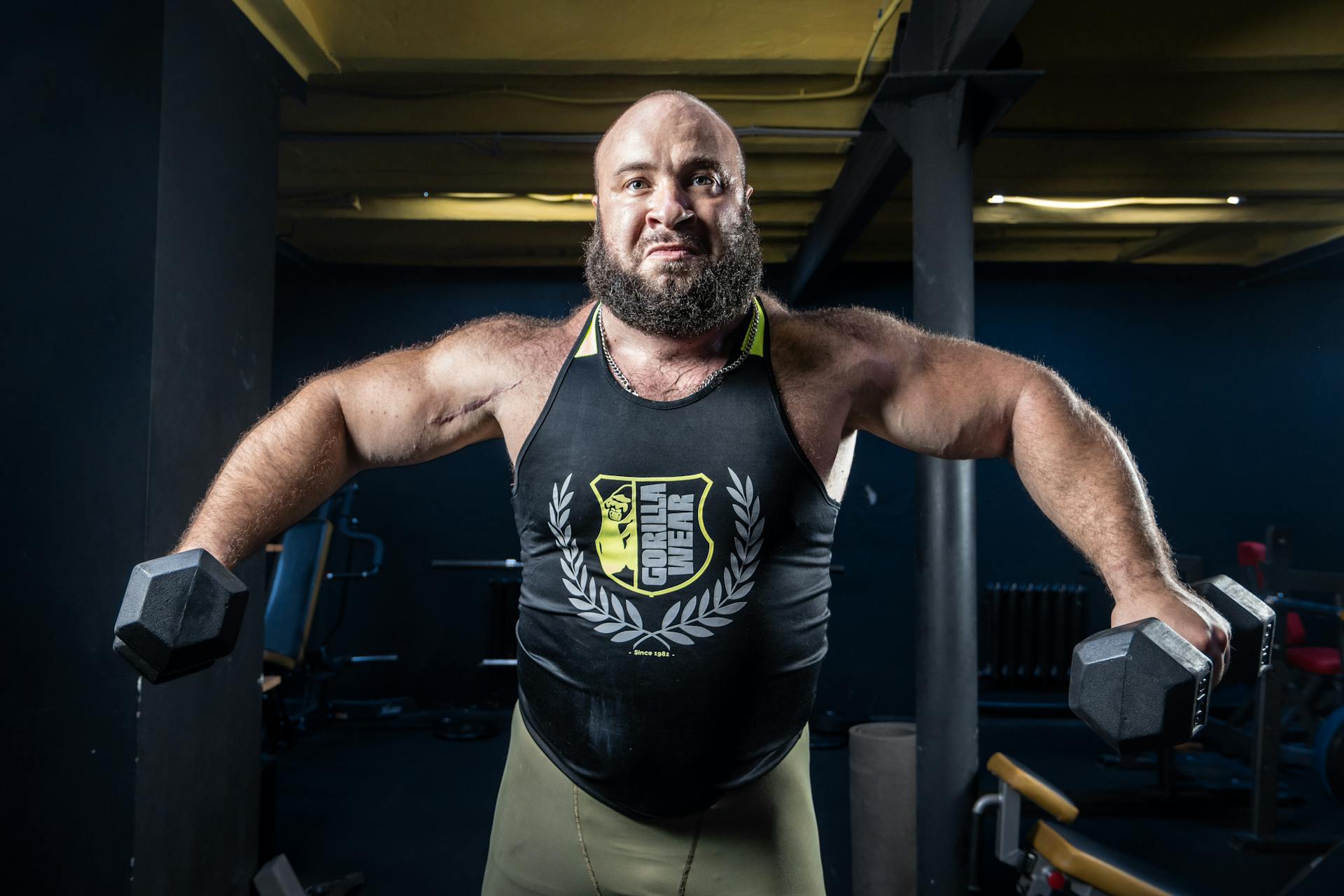 Bald Man Bodybuilding at Gym