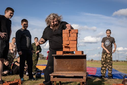 Man Breaking Bricks with Hand