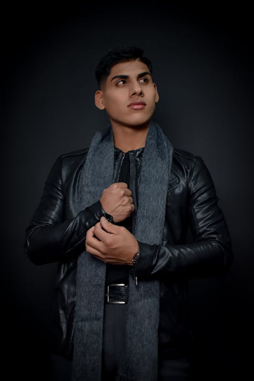 Man in Black Leather Jacket and Scarf
