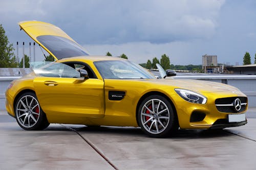 Yellow Mercedes on a Parking Lot 