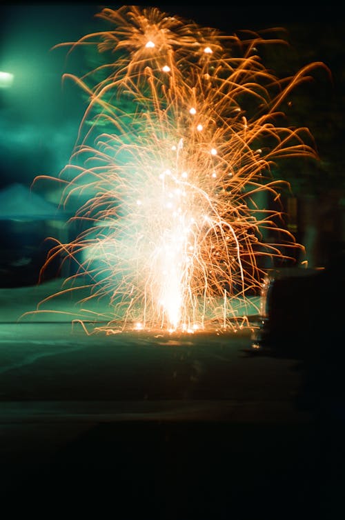 Fire and Sparks on the Street at Night 
