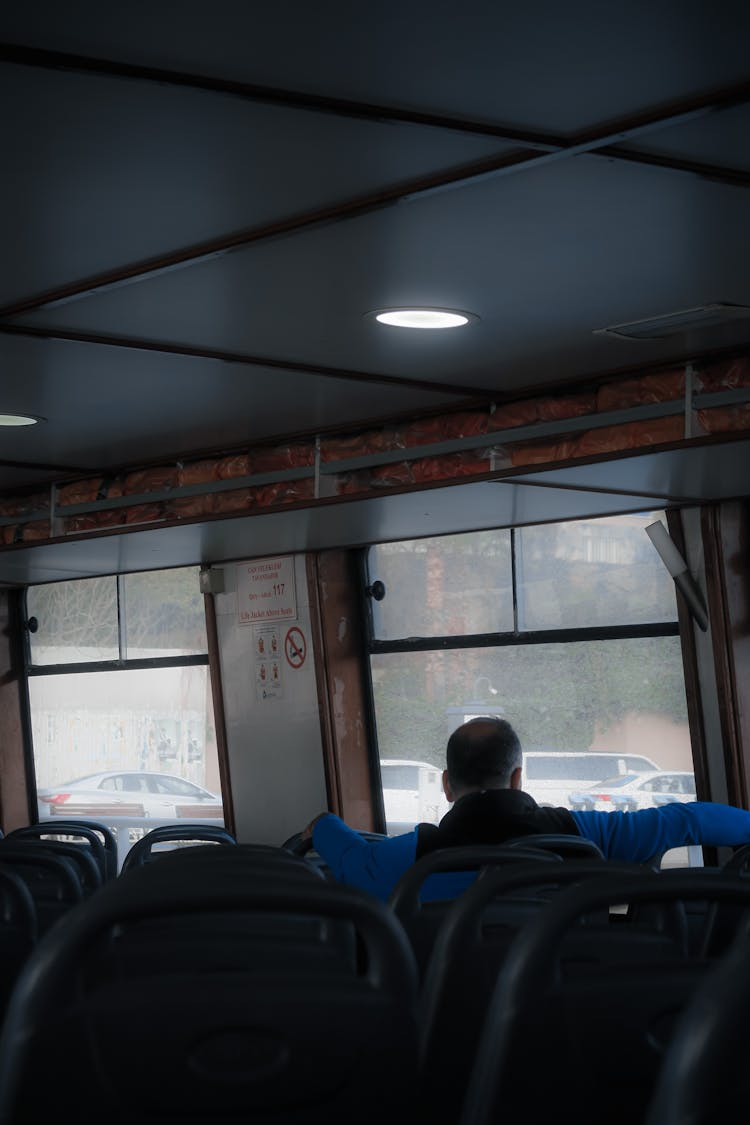 Man Travelling In Bus