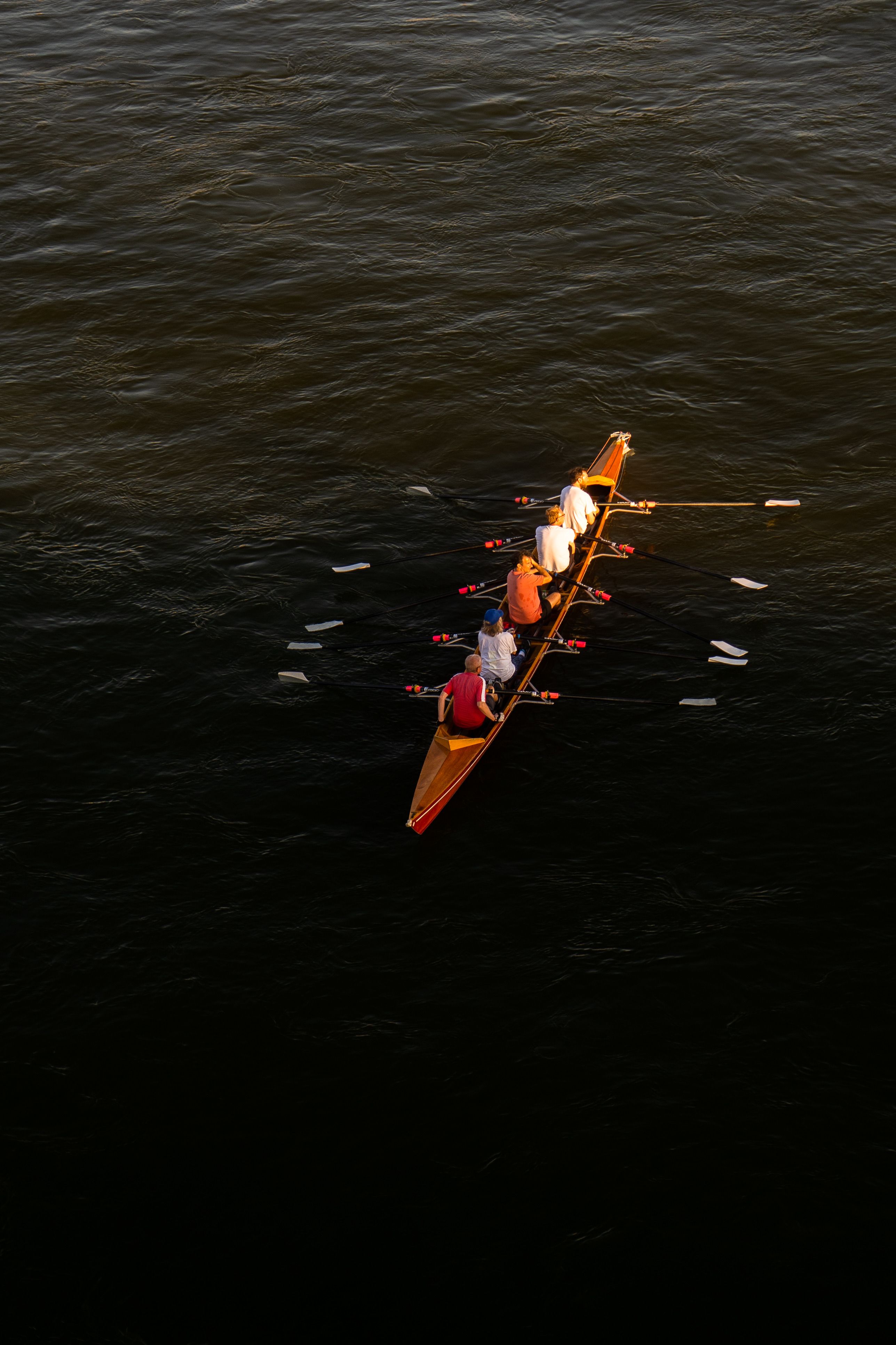 Aerial View of People Sitting in a Rowboat · Free Stock Photo