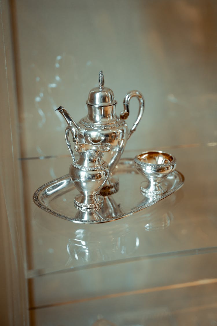 Silver Teapot On Tray