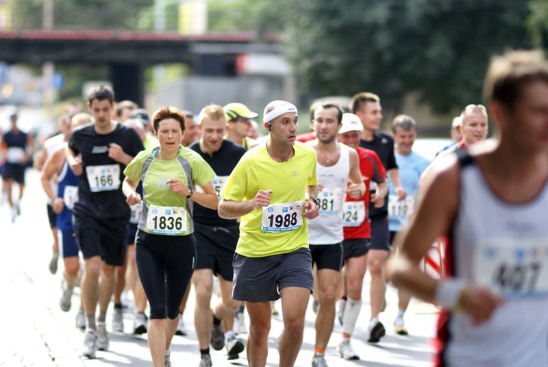 A group of runners taking part in a marathon together
