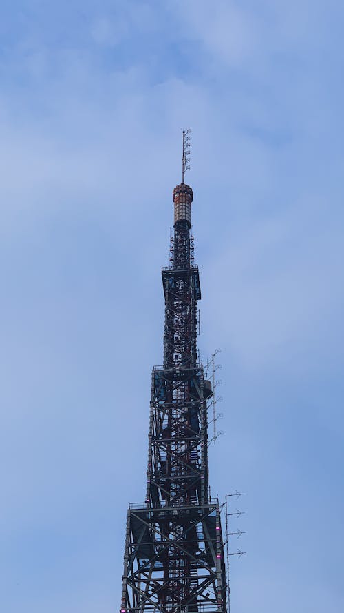 Broadcast Tower under Clouds