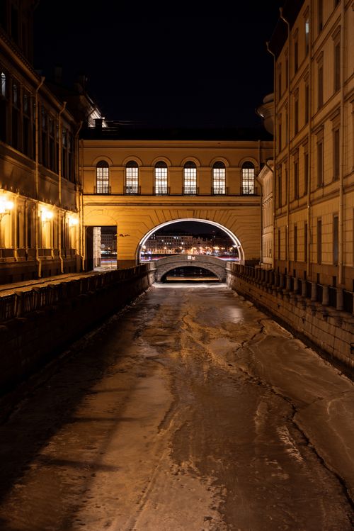 Free Night view of the illuminated Hermitage Bridge over the Winter Canal in Saint Petersburg, Russia. Stock Photo