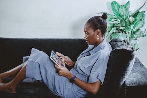 Woman Watching Movie on Tablet