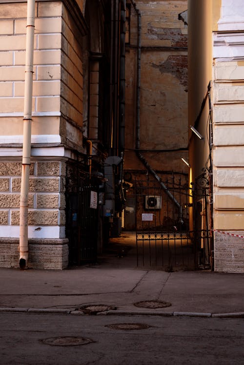 A Gate between the Walls of a Building in City 