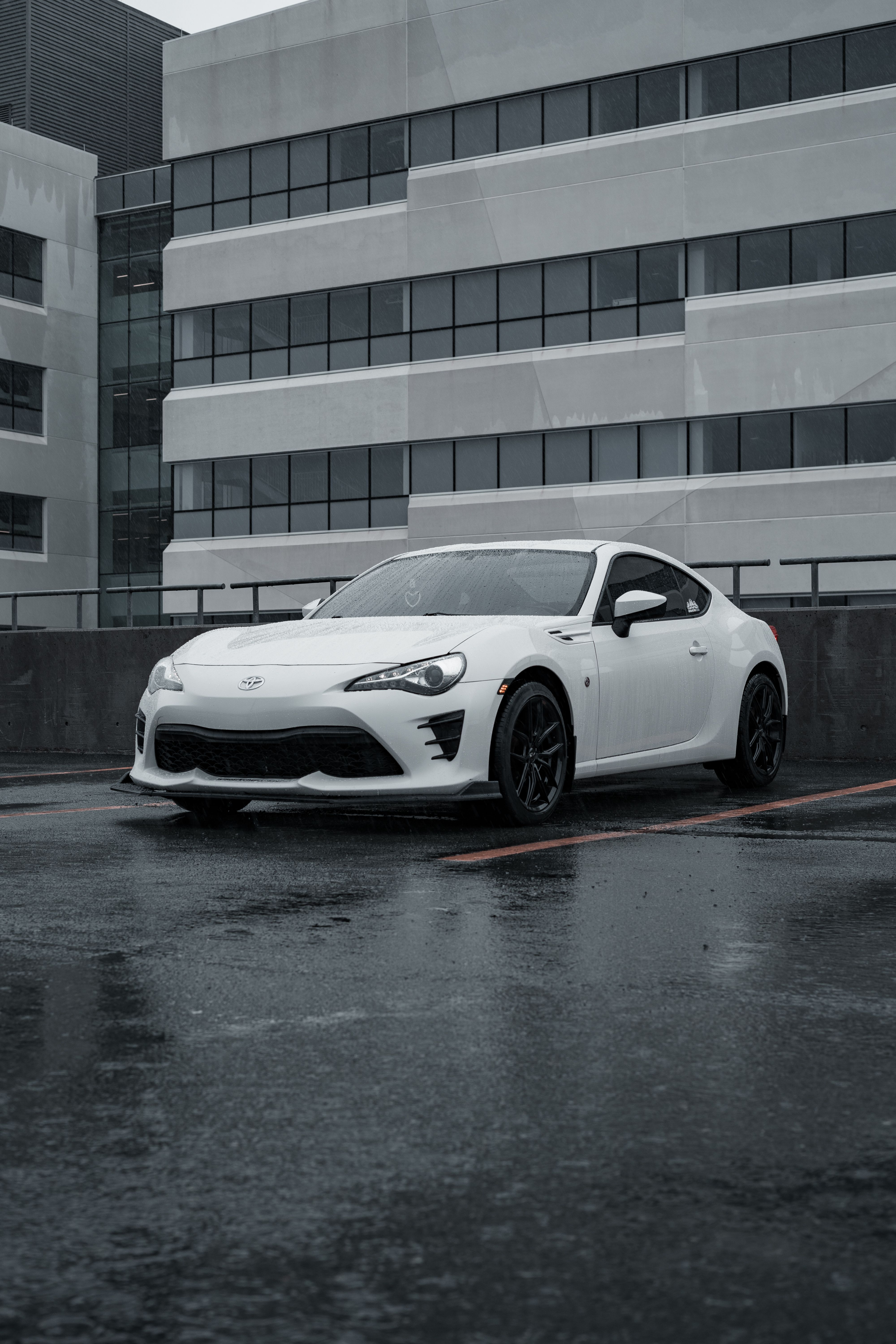 Toyota FT 86 Parked near Building in Rain · Free Stock Photo