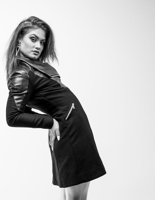 Model in a Mini Dress with Leather Inserts